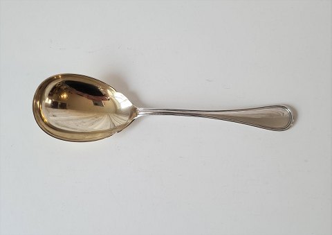 Double ribbed serving spoon with gilded leaf - 22 cm.