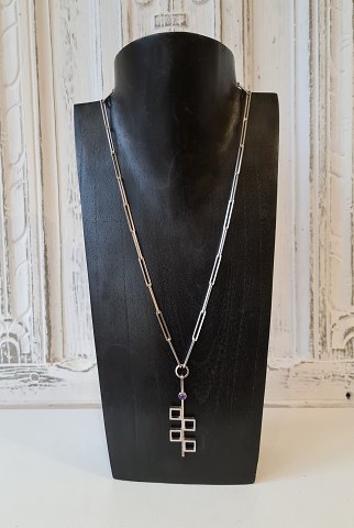N.E.From long necklace in silver with amethyst