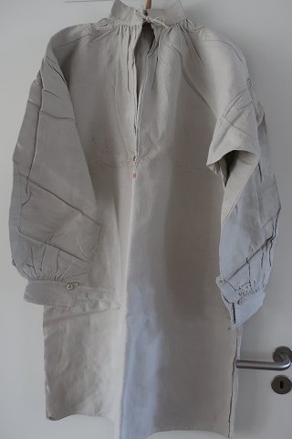 Shift / dress made of good old  flaxThis dress is with long slevesAn antique shift ((sewed by hand) with hand made buttons, embroidered hand-made initials to make the dress beautifulThis antique dress has gussets under the armsIn a good condit