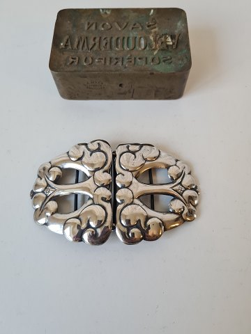 Silver belt buckle