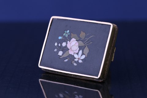 Mosaic brooch in 8 karat gold, with a beautiful floral pattern.