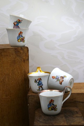 Bing & Grondahl high-handled cups with Christmas motifs and gold rim...