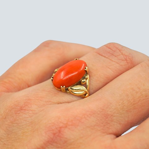 A coral ring in 14k gold