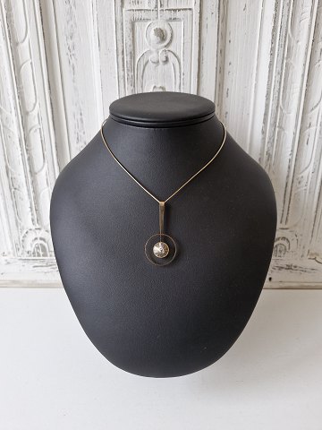 Bræmer Jensen necklace with pendant in 14 kt gold adorned with rock crystal