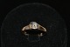 Antik Huset 
præsenterer: 
14 karat 
Guldring med 
Brillant 
Ring størrelse 
52