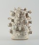 Christina Muff, Danish contemporary ceramicist (b. 1971). Large unique stoneware sculpture in offwhite glaze with ironcovered specks.Measuring: W 23 x H 29 cm.