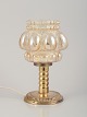 Helena Tynell, Finnish glass artist, for Limburg.Designer table lamp in clear glass and metal.
