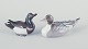 Bing & Grøndahl 
and Royal 
Copenhagen, two 
porcelain 
ducks.