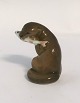 Royal Copenhagen. Porcelænsfigur. Odder med fisk. Model 2333. Højde 5 cm. (1 
sortering)