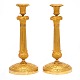 Aabenraa 
Antikvitetshandel 
præsenterer: 
Et par 
lueforgyldte 
Empire bronze 
stager. 
Frankrig ca. år 
1810. H: 30,5cm