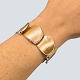 Ole Lynggaard; Bracelet in 14k gold and white gold, set with four diamonds