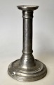 Empire 
candlestick in 
pewter, 19th 
century.