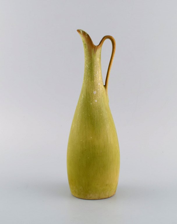Gunnar Nylund (1904-1997) for Rörstrand. Kande i glaseret keramik. Smuk 
æggeskalsglasur i lyse lime nuancer. Midt 1900-tallet.
