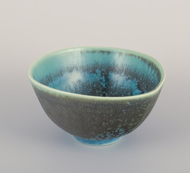 Berndt Friberg for Gustavsberg, Sweden. "Selecta" ceramic bowl in eggshell glaze with blue and green tones.
