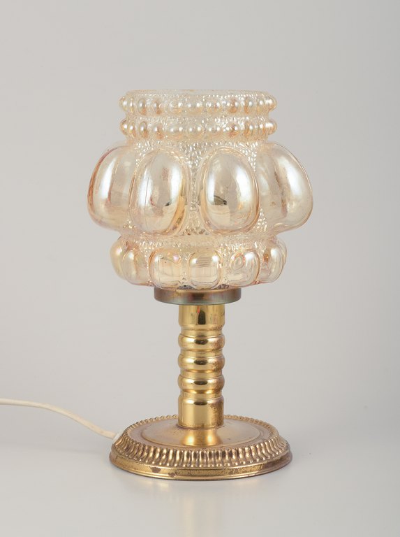 Helena Tynell, Finnish glass artist, for Limburg.Designer table lamp in clear glass and metal.