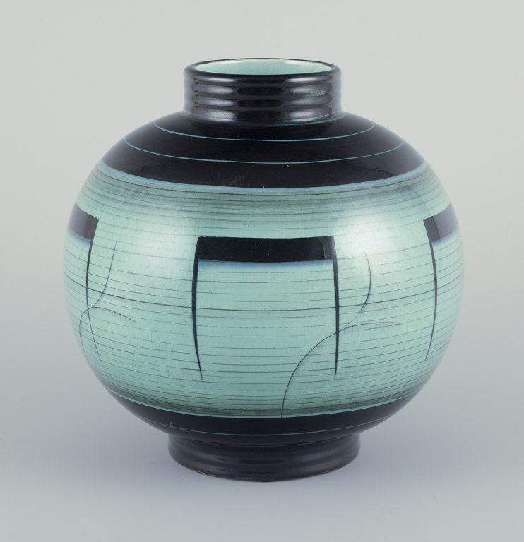 Ilse Claesson for Rörstrand.Large and round vase in glazed faience.