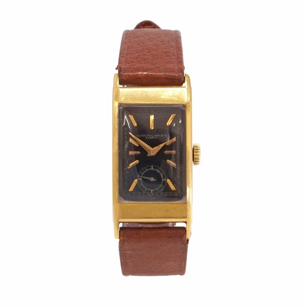 18kt gold Patek Philippe Tegolino watch 1940s. Dial marked "Patek Philippe & Co Geneve". Case size: 20x35mm
