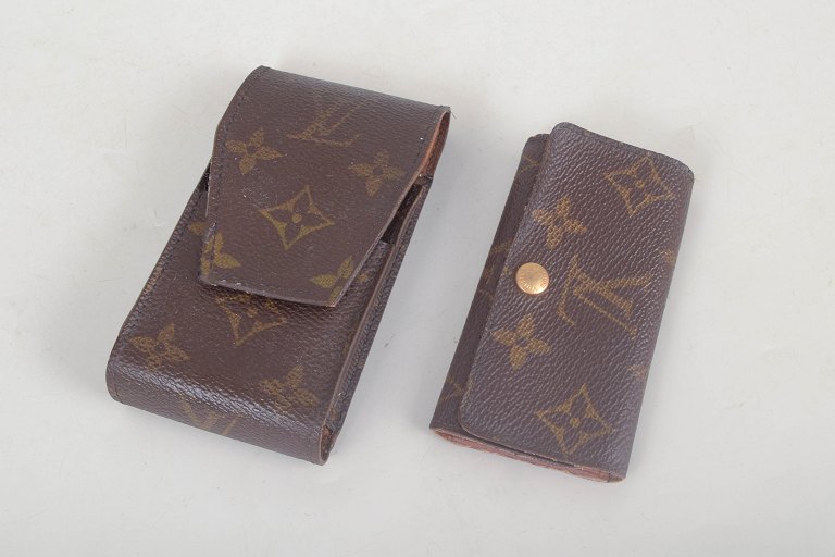 Louis Vuitton cigarette case and key holder.